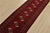 An authentic vintage tribal Turkmen runner, hand-knotted with fine wool and natural dyes. This nomadic rug features a row...
