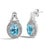 Contemporary Sterling Silver Oval Blue Topaz and Diamond Accent Twist and Halo Drop Earrings, Pair For Sale - Image 3 of 4
