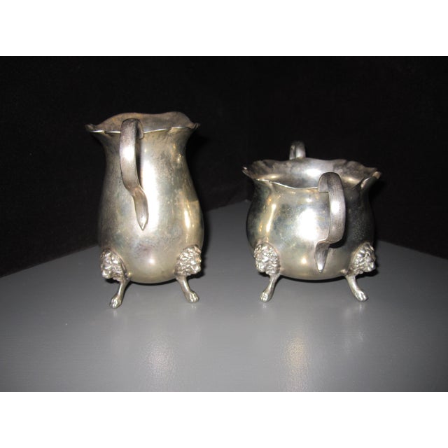 Cream & Sugar,Sterling silver pair Lion Motif Condition: Very Good, no dents or distortions Monogrammed with " M" Easy...