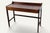 An elegant Danish dressing table/desk from the 1960s, representative of the meticulous craftsmanship of Scandinavian...