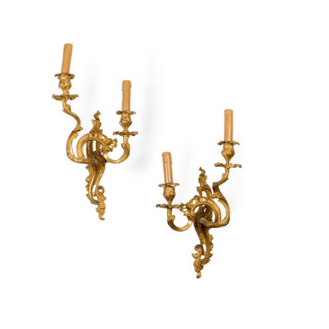 Presenting a pair of Louis XV style sconces, circa 1900. Perfect for the hallways.