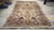 A very large rug, in overall very condition for its age. Length 360 cm Depth 248 cm