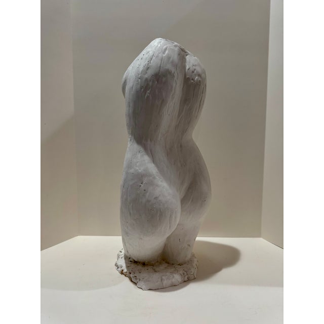 Larry Mohr (American, 1921-2013) female torso sculpture in white painted plaster. This figurative work showcases Mohr's...