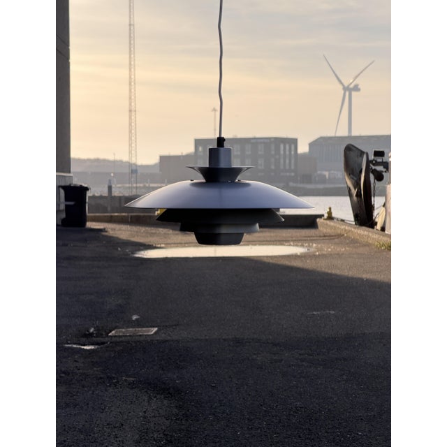 Ultra-rare Jeka pendant light in aluminum, super cool look and certainly more exciting than a conventional Louis Poulsen...