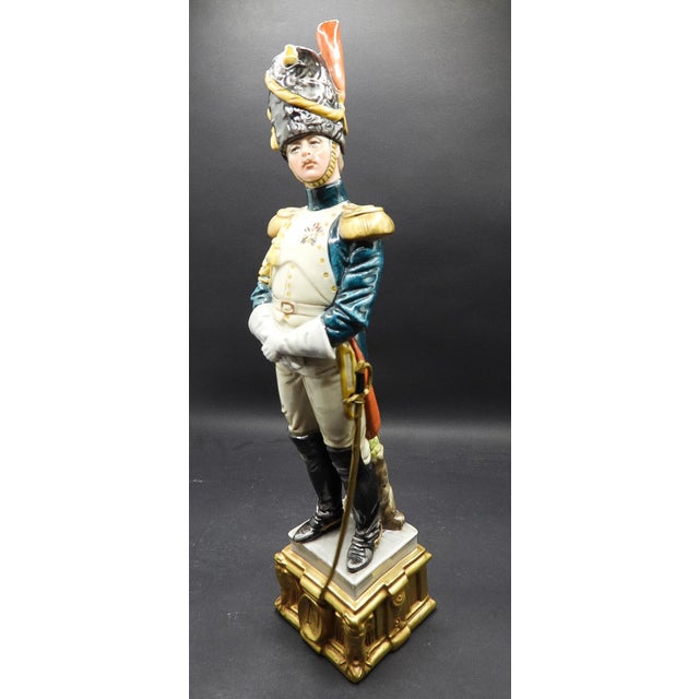 This marvelous Capodimonte Italian porcelain figurine is created as the gorgeous and realistic " Grenadier Officer. " This...