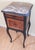 Exceptional French table from the early 1900's that has been hand-crafted from heirloom grade mahogany and French walnut...