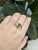 Pure, modern, and radiant — this 2.13 carat cushion-cut Arizona peridot ring offers a fresh take on the solitaire. The...
