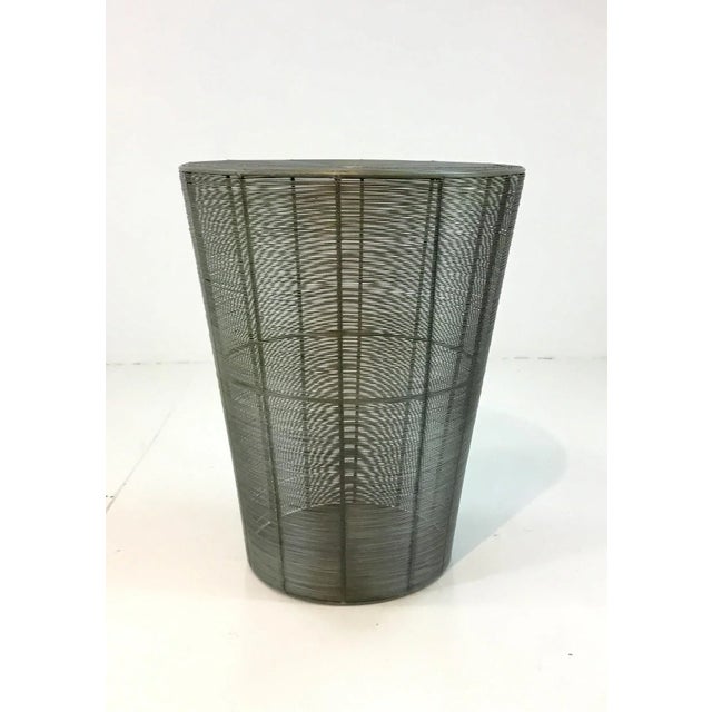 Stylish modern industrial Arteriors metal basket side table, showroom floor sample