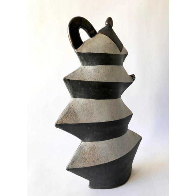 Flattened stoneware Post Modernist vase by California studio artist Kazuko Matthews. Teapot measures 16.5" by 9.5" by 3"...