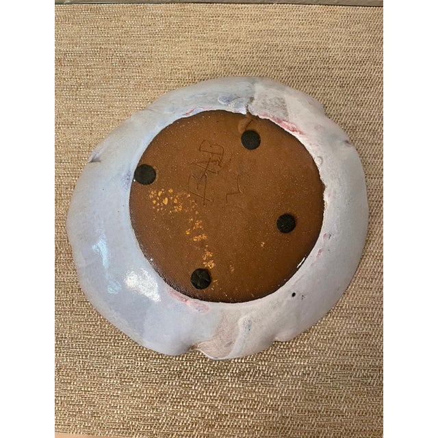 Beautiful mid century modern signed glazed pottery bowl in bluish and pinkish tones. Signed BAB on the bottom. Excellent...