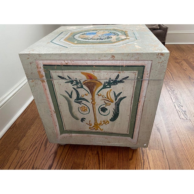 Painted cube table that also serves as storage table. In good condition. Nick on one of rounded feet. No structural...