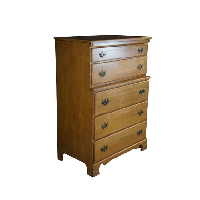 A rare early vintage Thomasville Furniture Industries (TFI) tallboy chest of drawers, circa 1940s. The dresser highlights...