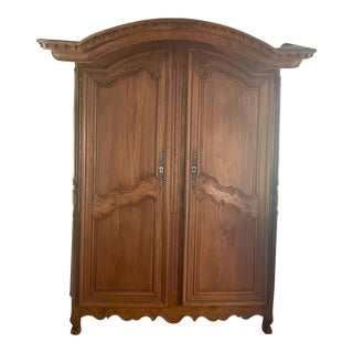 French Louis XV Elm Armoire W/ “Chapeau De Gendarme" Shaped Cornice For Sale