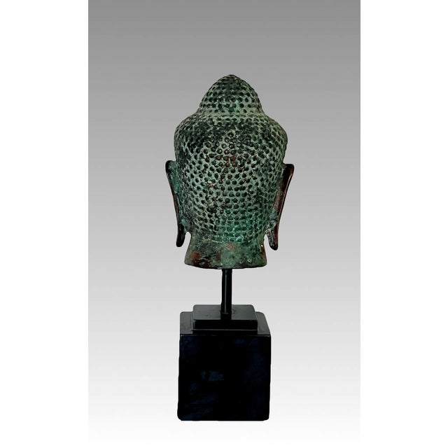 Boho Chic South East Asian Buddha Head Mounted on Square Black Pedestal For Sale - Image 3 of 11
