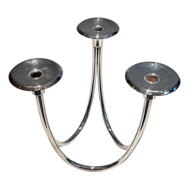Design/One silver metal candlestick For Sale