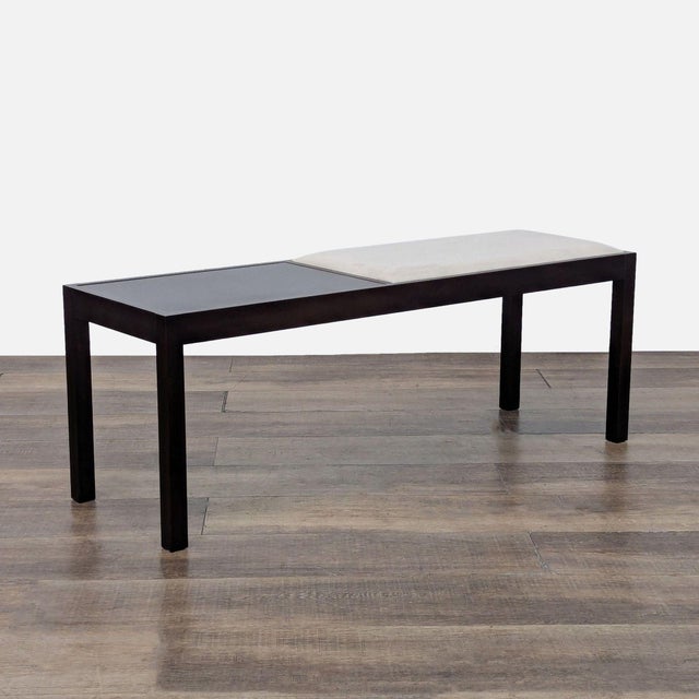 Wood bench with faux leather cushion. Brand: Crate & Barrel. Dimensions (in): 50W x 16D x 18H.