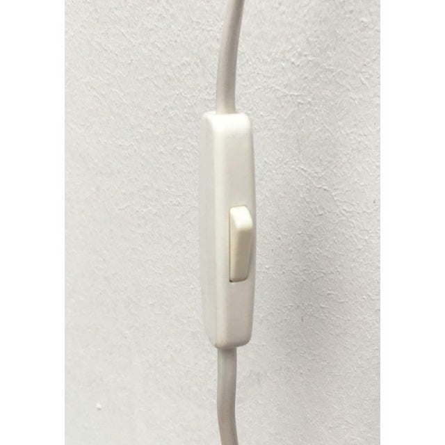 Two wall lights from the Danish manufacturer Horn. A particularly playful design. The name Harlequin is perfectly fitting....