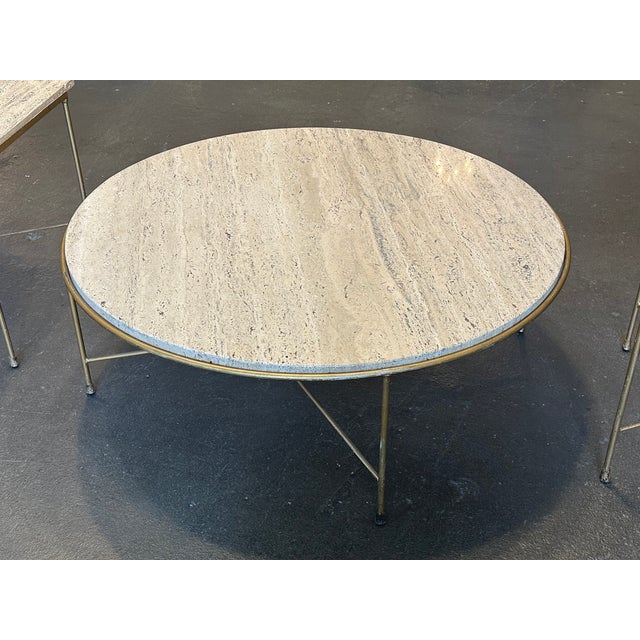 Attributed to Paul McCobb Pavilion Collection tables in travertine, produced for a short time by Arbuck. Offered is one...