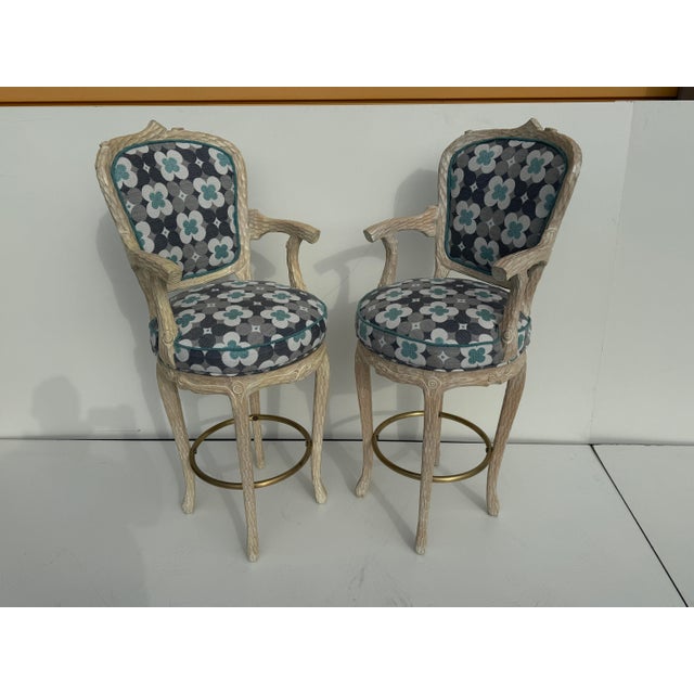 Set of four hand carved faux bois twig bar stools in the style of Palm Beach Regency Carved wood is finished in antique...