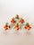 Charming set of 6 vintage Tole napkin rings with cheerful orange flowers and green foliage on a white twisted rope ring....