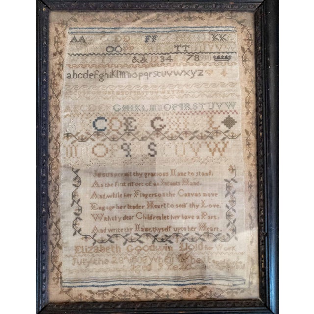 We are selling this simple early 19th century sampler. This needlework sampler is English Georgian period. The sampler is...