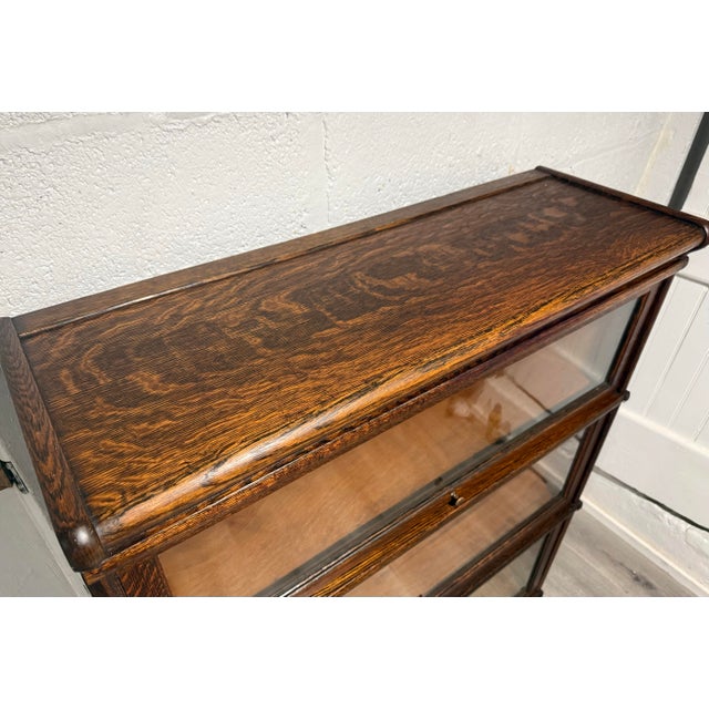 Beautiful antique Globe-Wernicke oak barrister bookcase, complete with 3 original stacking sections plus the base and top...
