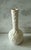 Vintage mid century ceramic bud vase with white lava glaze. Made in the USA by Royal Haeger. Stamped on the bottom "Royal...