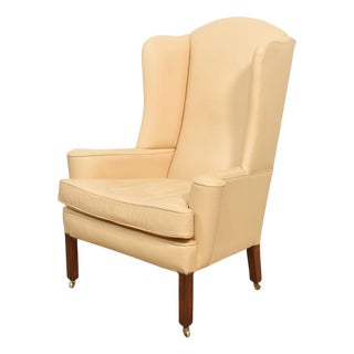 Leather Upholstered Wingback Armchair, 1920s For Sale