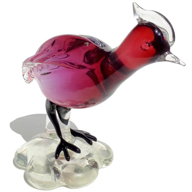 Beautiful vintage Murano hand blown Sommerso red amethyst Italian art glass guinea or quail bird sculpture. The piece is...