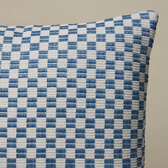 This pillow features Elkart with a knife edge finish. Elkhart is a soft, artisanal small woven check with a wonderfully...