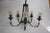 This iron chandelier has been completely updated with beautiful bubble glass globes and Edison bulbs. The bulbs can be...