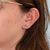 Vivid emeralds glow within a brilliant halo of diamonds in these oval stud earrings, set in solid 14K white gold. The...