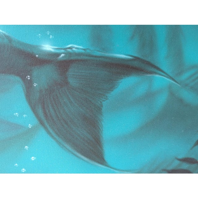 Contemporary teal toned underwater seascape painting of mermaid by Californian artist Elias Noah. The work features a...