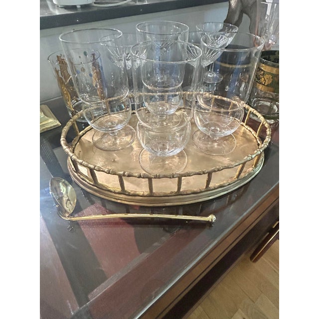 This oval brass gallery tray is the perfect size for a bar cart or vanity. At 12” wide, it still has the vintage look of...