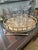 This oval brass gallery tray is the perfect size for a bar cart or vanity. At 12” wide, it still has the vintage look of...