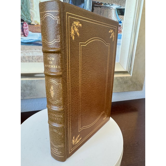 As new condition full brown leather hardcover boards, Includes an elaborately decorated gold front and rear cover design,...