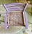 vintage Danish Modern style ladder-back armchair featuring a hand-woven envelope-pattern seat. While traditionally crafted...