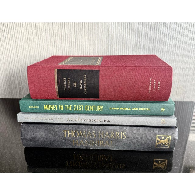Assortment of Hardcover Decorative Books for Shelf Accents Four decorative books to add color and interest to your...