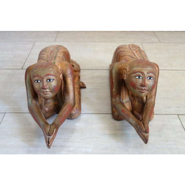 Rare and authentic pair of Burmese Buddhist monk statues in prayer, dating from the 19th century. Hand-carved in wood,...