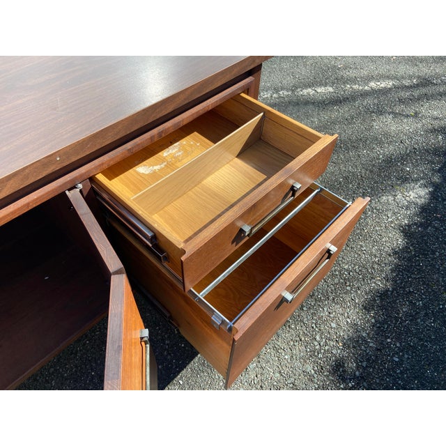 The Vintage Mid-Century Modern Credenza Storage File Cabinet by Alma Desk Company is a stunning piece of furniture from...