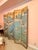 Antique Six Panel Watercolor Floor Screen A unique screen in muted watercolors depicting a waterfront village scene....