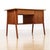 This Danish mid-century writing desk showcases the clean lines and refined craftsmanship that define Scandinavian modern...