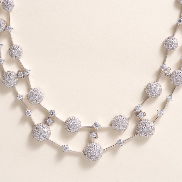 Estate Diamond Pavé Rivière Necklace Estate diamond necklace crafted in a distinctive modern take on the classic rivière...