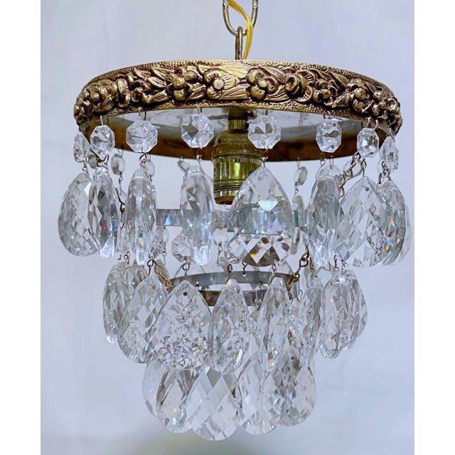 Italian upside down layered cake chandelier with bronze rim, octagon and Swedish cut crystal drops. Restored, rewired and...