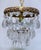 Italian upside down layered cake chandelier with bronze rim, octagon and Swedish cut crystal drops. Restored, rewired and...