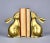 Vintage bunny bookends. Made from solid brass, in classic mid century style. Both of the bunnies are reaching up as if...