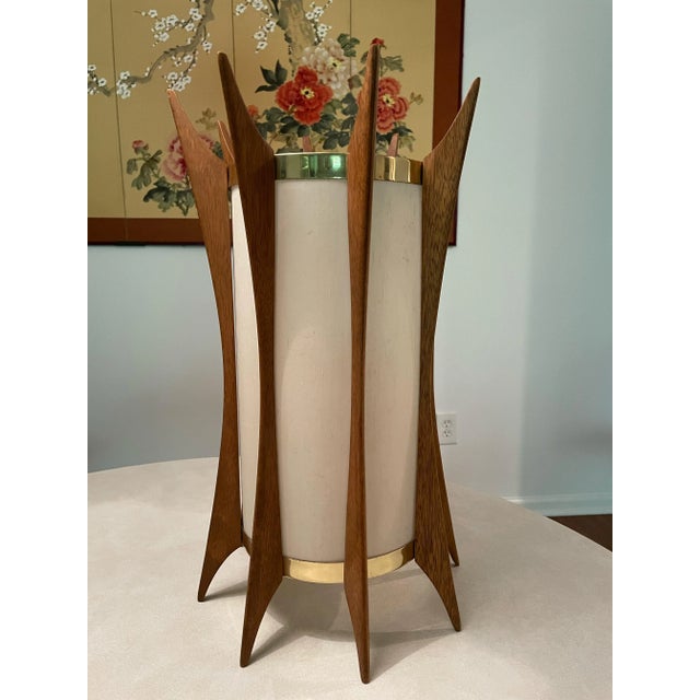 A rare and sculptural mid-century modern swag pendant lamp in the style of Modeline of California and the organic modern...