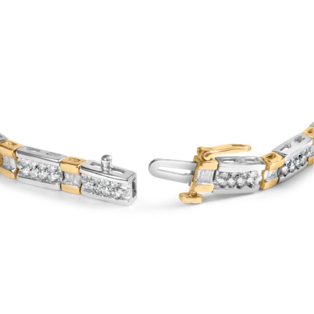 Indulge in the epitome of luxury with this exquisite diamond bracelet. The 14k two-tone gold perfectly complements the 180...