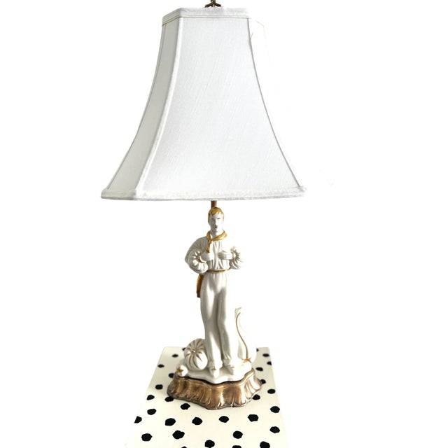 This is a rare and unique Vintage Revival Style White & Gold Porcelain Male Figural Table Lamp with Brass Base. New Shade...