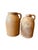 Hand-thrown stoneware jugs with rich honey-brown rustic finish and traditional European form. Beautiful displayed together...